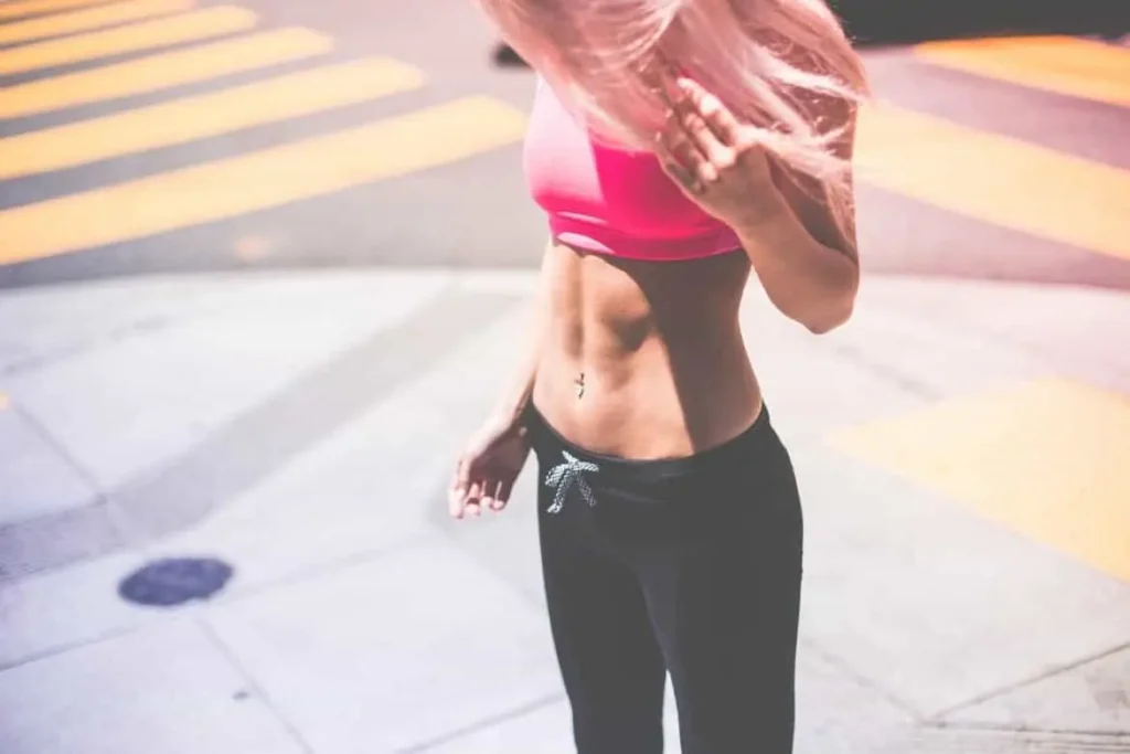 Woman with toned stomach after LA-EMS Body Sculpting Treatment Hounslow West
