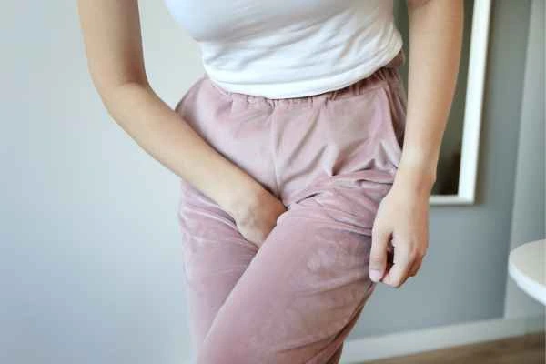 woman running for the toilet because of urinary incontinence Hounslow West
